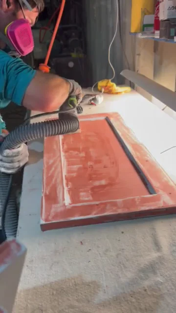 Sanding a glazing-putty skim smooth