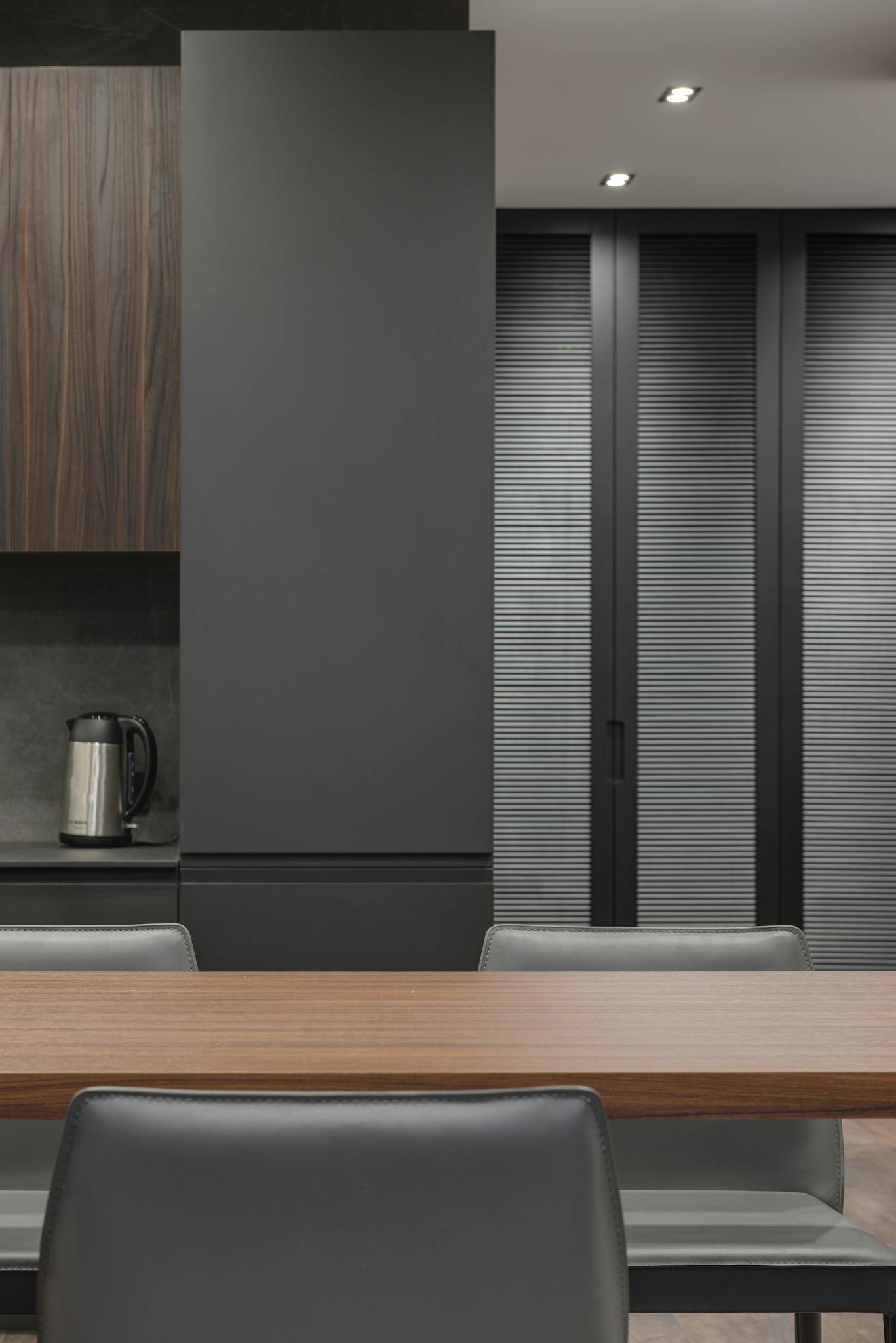 Stylish kitchen with sleek lines, showcasing modern and minimalist design elements.