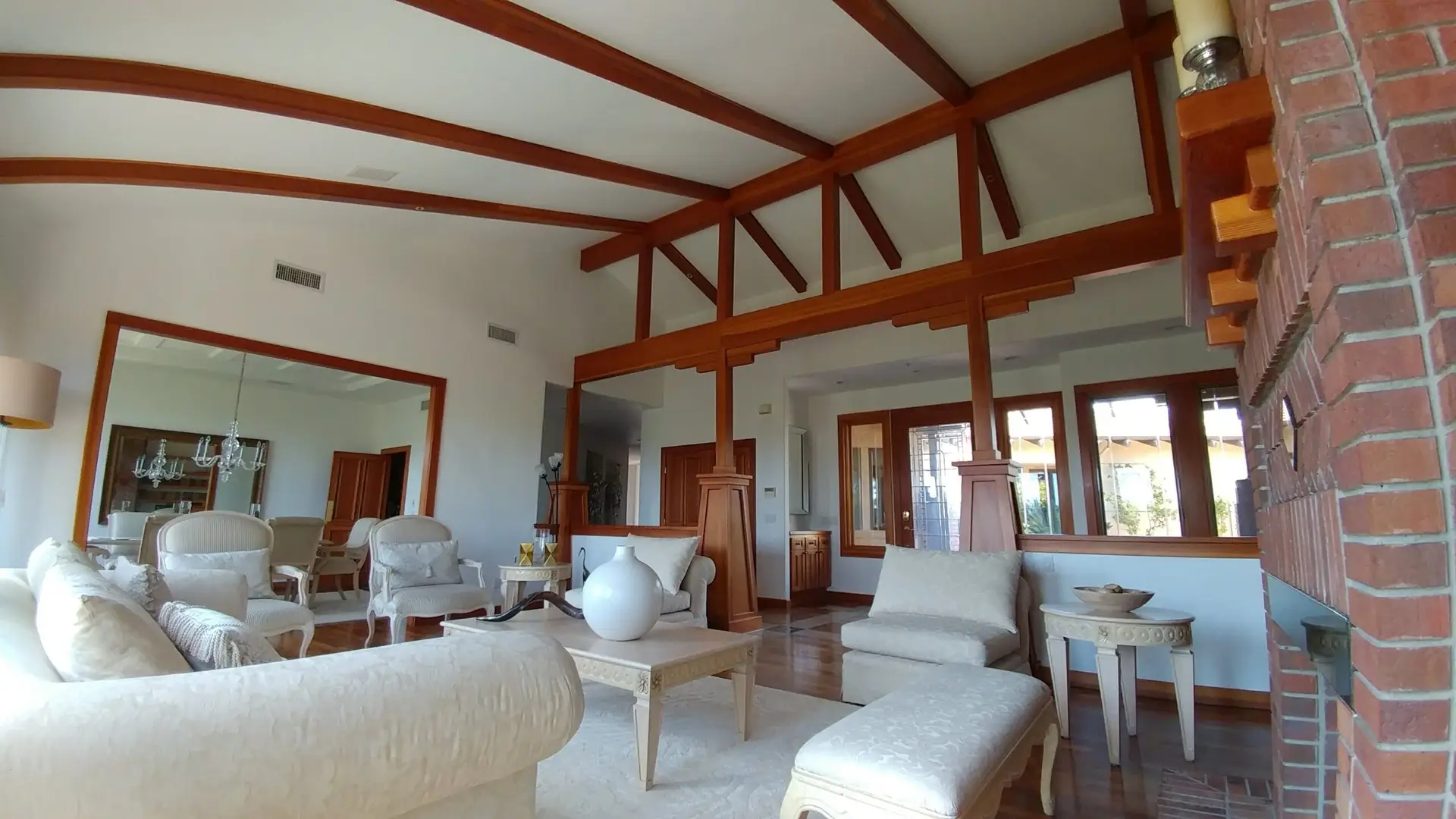 interior house painting in Temecula with wood stained beams and white walls, ceilings and trim by Parallel Painting